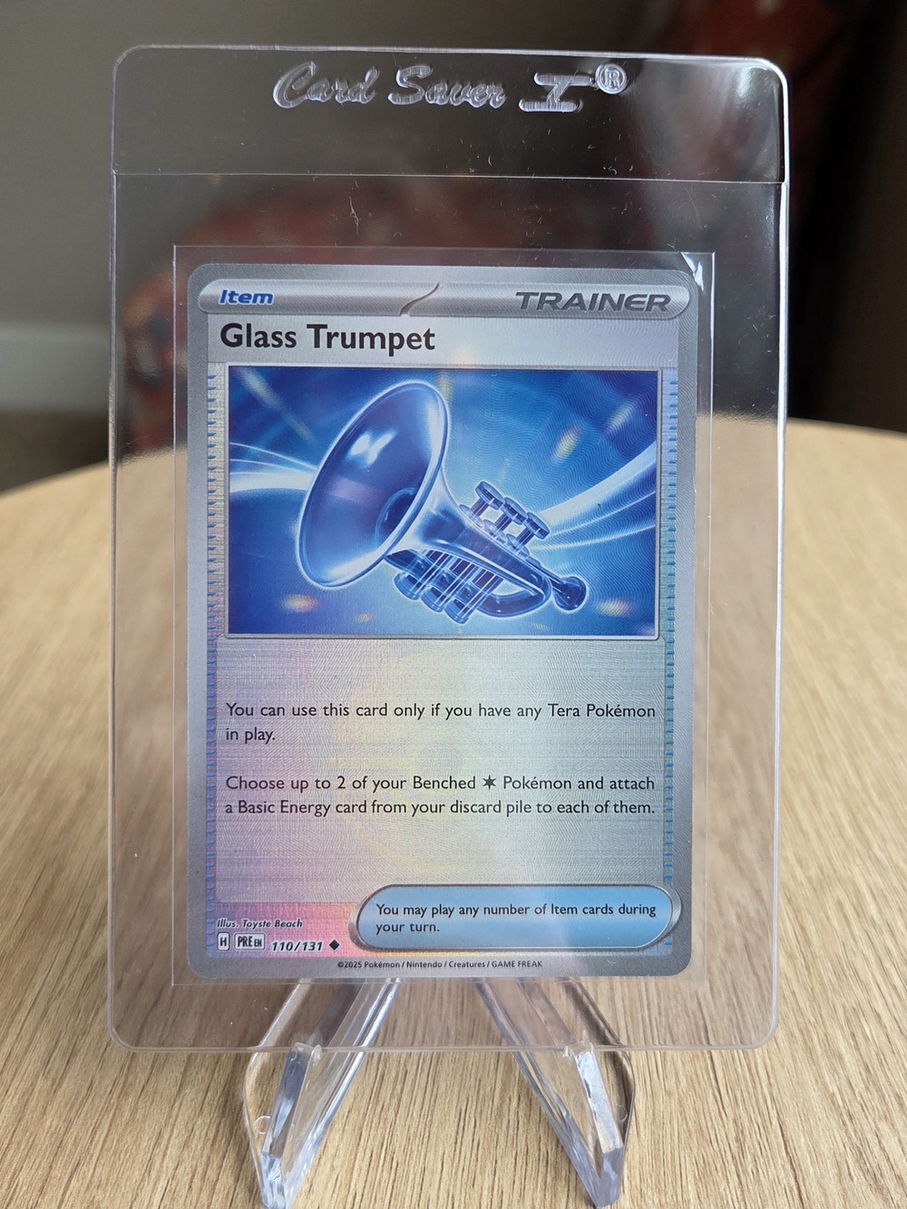 Glass Trumpet Pokemon Card Poke Ball from Prismatic Evolutions Trainer Holo